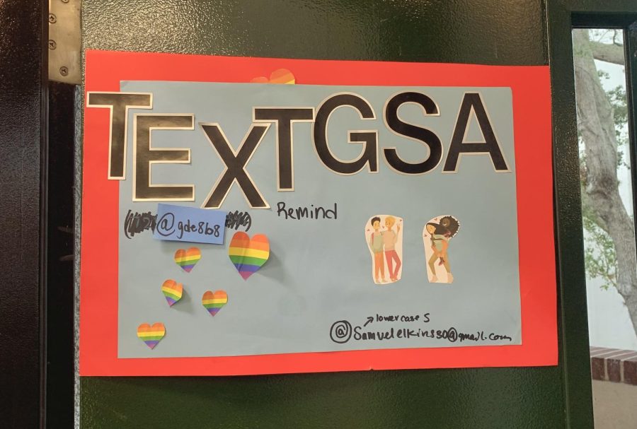 The Gay-Straight Alliance poster on the door of Mr. Belcastros classroom