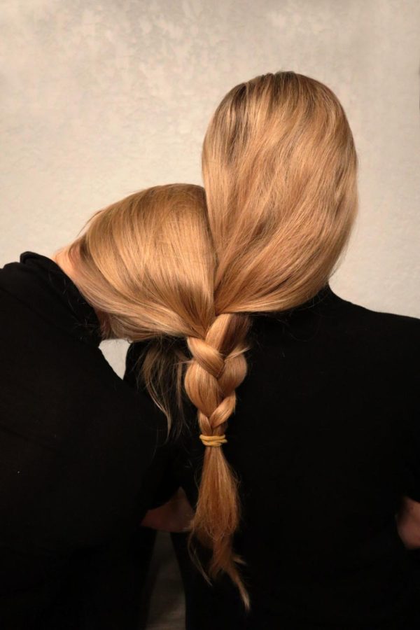 Gloria Privis’ piece entitled ‘Unity’ is in connection to the Russia-Ukraine War. The picture shows two women, her mother and her cousin, with their hair braided together.