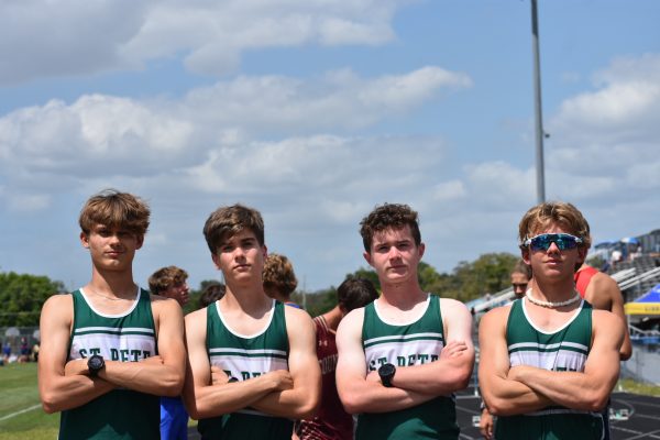 The 4x800 team, compromised of Andy Scott, Aiden Mosaill, Drew Mize, and Finnegan Cox at the PCAC Championships at East Lake High School.